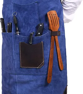 Durable leather kitchen work apron with multi pockets, ideal for BBQ, baking and cooking tasks.