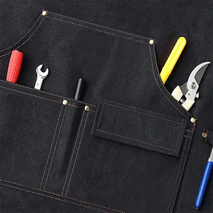 Heavy duty canvas work apron with multiple tool pockets, ideal for gardening and cooking.