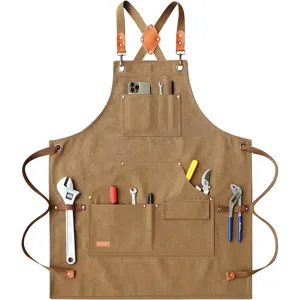 Heavy duty canvas work apron with multiple tool pockets, adjustable cross leather straps for BBQ kitchen.