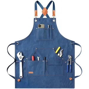 Durable denim work apron with multiple tool pockets, cross-back straps for comfort.