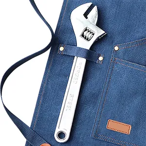 Heavy duty denim work apron with tool pocket and durable metal rivets for kitchen BBQ baking.