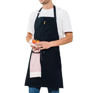 Delantal de trabajo negro profesional de lona con múltiples bolsillos para cocina y café.