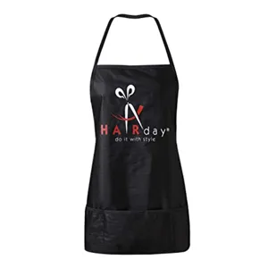 Black hairdresser apron with scissors print and front pocket, waterproof styling workwear.