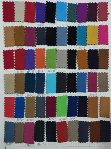Leather apron color swatch card showing various rich colors and codes for custom options.