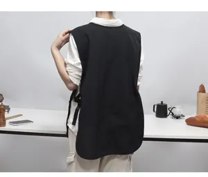 Waterproof kitchen apron vest for cooking and cafe work, back view showing pocket details.