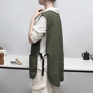 Kitchen vest apron with deep green color, waterproof design, side pockets and adjustable buckle.