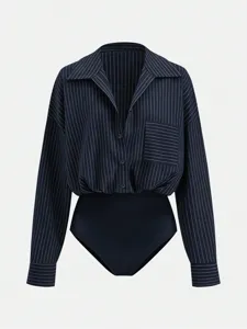 Detailed view of the dark vertical striped lapel bodysuit shirt showcasing neat cuffs and buttons.