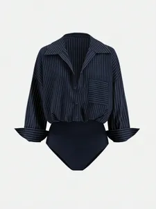 Dark blue pinstripe long sleeve lapel buttoned shirt bodysuit detail view showing refined tailoring.