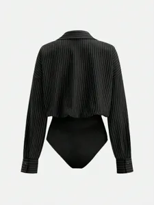 Black pinstripe long sleeve lapel button cuff bodysuit detail shot showing classic tailored style.