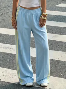 Women's high-waisted casual track pants with side stripes, Y2K retro loose trousers for daily wear.