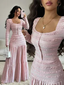 Pink ruffle midi dress detail, square neck and button-down close-up, elegant fabric texture showcase.