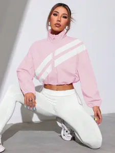 Pink colorblock cropped windbreaker jacket with diagonal stripes, stylish casual outerwear.