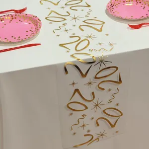 Chemin de table en tulle doré 20e anniversaire, élégante décoration transparente détail.