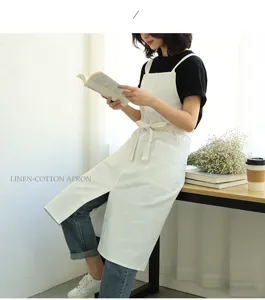 White linen-cotton apron with pockets and front split, perfect for kitchen and cafe use.