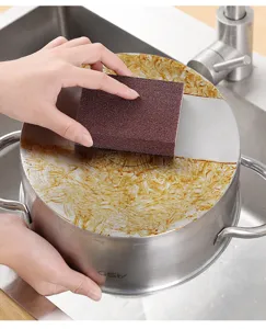 Nano carborundum cleaning sponge for stubborn rust and heavy duty kitchen pot cleaning tool.