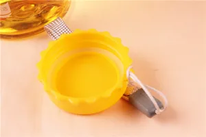 Close-up detail of the vibrant yellow bottle cap and portable lanyard for sports water bottle.