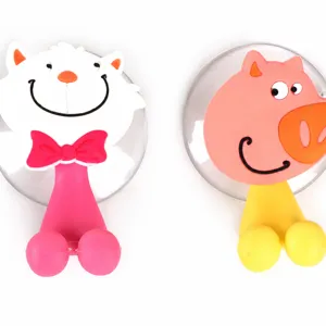 Cartoon animal suction cup toothbrush holder, cute cat and pig design for bathroom wall.