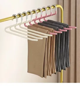 Stainless steel multi-layer trousers hanger, space-saving anti-slip design for closet storage.