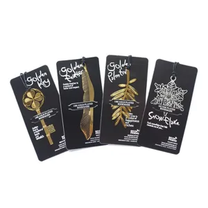 Creative metal bookmark set with exquisite black cards featuring key feather and snowflake designs.