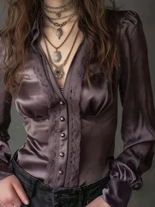 Elegant solid color deep V-neck lace trim long sleeve women blouse with vintage necklaces.