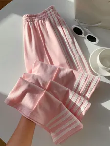 Pink Y2K casual pants detail, high waist elastic design with classic side white stripes.