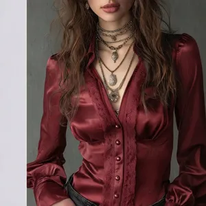 Elegant women's solid long-sleeve satin blouse with deep V-neck and delicate lace trim.