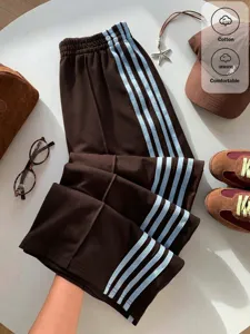 Y2K retro brown casual trousers featuring light blue side stripes and comfortable high waist.