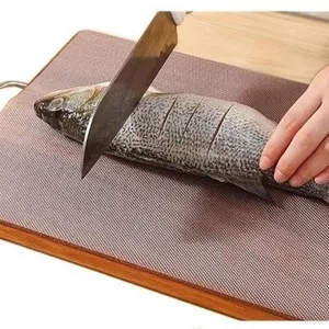 Disposable cutting board mat for kitchen food prep, anti-slip chopping sheet design.
