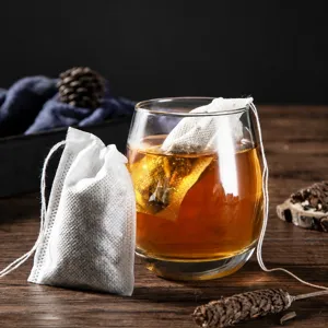Disposable non-woven tea bags filter bags for loose tea soup herbs with drawstring mesh.