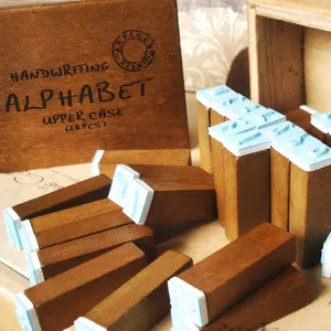 Retro wooden alphabet stamps uppercase set with storage box for diary crafting art.