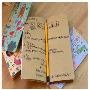 Cute cartoon traveler notebook set with kraft paper pages, ideal for daily journaling.