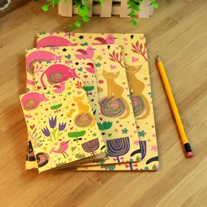 Cute cartoon cat and bird pattern portable notebook set with yellow cover, ideal for daily study.