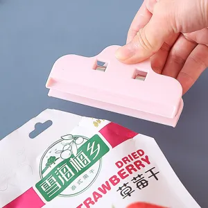 Plastic food sealing clip for snack bags, cute pink cloud design for fresh keeping.