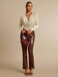 Body a maniche lunghe con scollo ad anello, design drappeggiato e vestibilità slim.