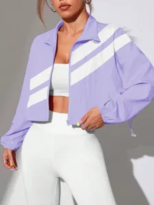 Detailed view of the women colorblock diagonal striped zip up cropped jacket, stylish streetwear.