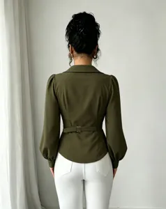 Back view detail of the chic army green long sleeve blouse featuring lapel and waist belt.