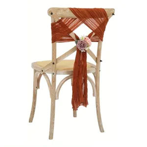 Rustic wedding chair sash chiffon gauze bow with floral decoration for party banquet decor detail.