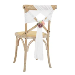 White tulle wedding chair sash with floral decor, elegant bow tie for party banquet decoration.