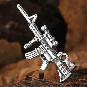 Stainless steel assault rifle pendant necklace detail, punk rock tactical jewelry for men.
