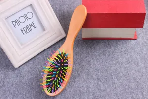 Wooden air cushion massage hair brush with colorful wavy bristles for anti static hair care detail shot