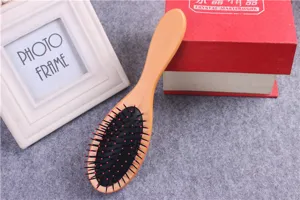 Wooden cushion hair brush with anti-static paddle design for comfortable scalp massage daily use.