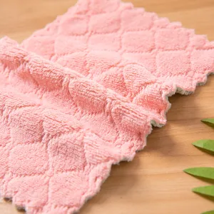 Detailed view of pink double-sided microfiber cleaning dish cloth with quilted texture.