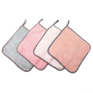 Hanging coral fleece kitchen hand towels, super absorbent dishcloths with checkered edges.