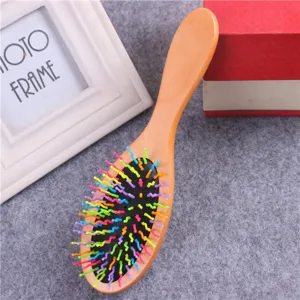 Wooden hair cushion massage brush with colorful wavy bristles for daily hair care and anti-static styling.