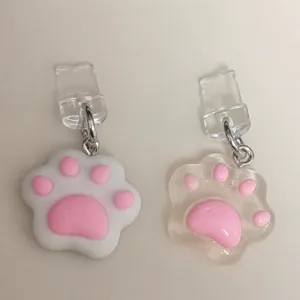 Cute cat paw phone charm resin dust plug pendant for mobile phones and charging ports detail view.