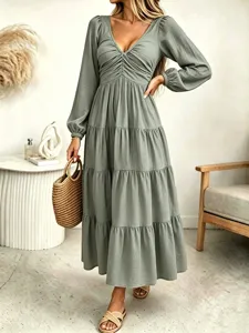 Details of the French style long sleeve V-neck tiered maxi dress, elegant ruched bust design.