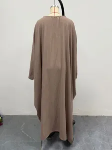 Casual loose solid color batwing sleeve dress detail view, comfortable long flowy design.