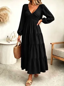 Elegant black long sleeve V-neck tiered maxi dress for women, stylish French casual wear.