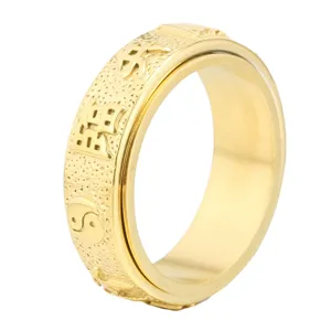 Gold stainless steel spinner ring for men with embossed Tai Chi and Chinese symbols chic.