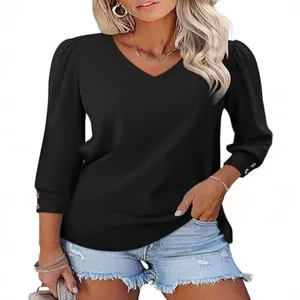 Casual black v-neck top for women with puff sleeves and chic button cuffs, loose fit.